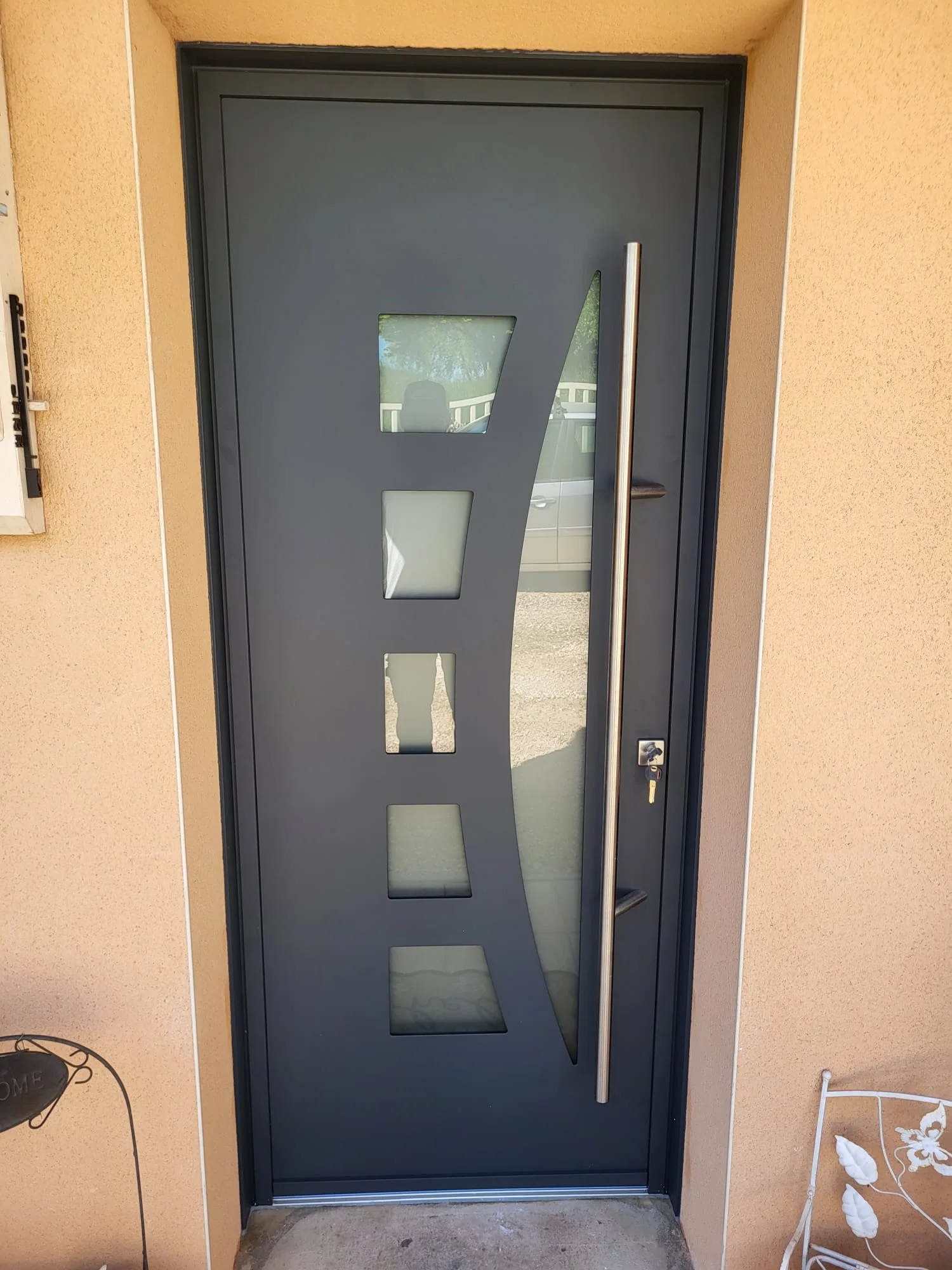 Remplacement d'une porte d'entrée aluminium Centauria gris anthracite RAL 7016 Courlans 39570