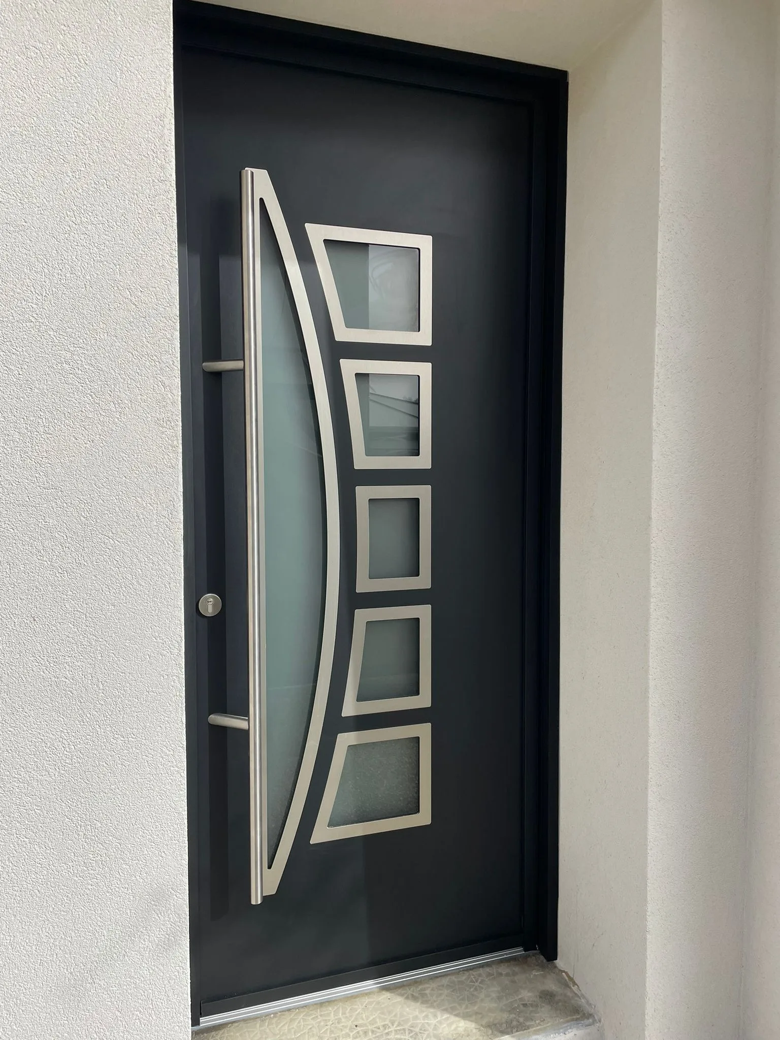 Remplacement d'une porte d'entrée aluminium Centauria avec insert inox à Beaurepaire-en-Bresse (71580)